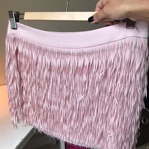 Light pink party skirt.